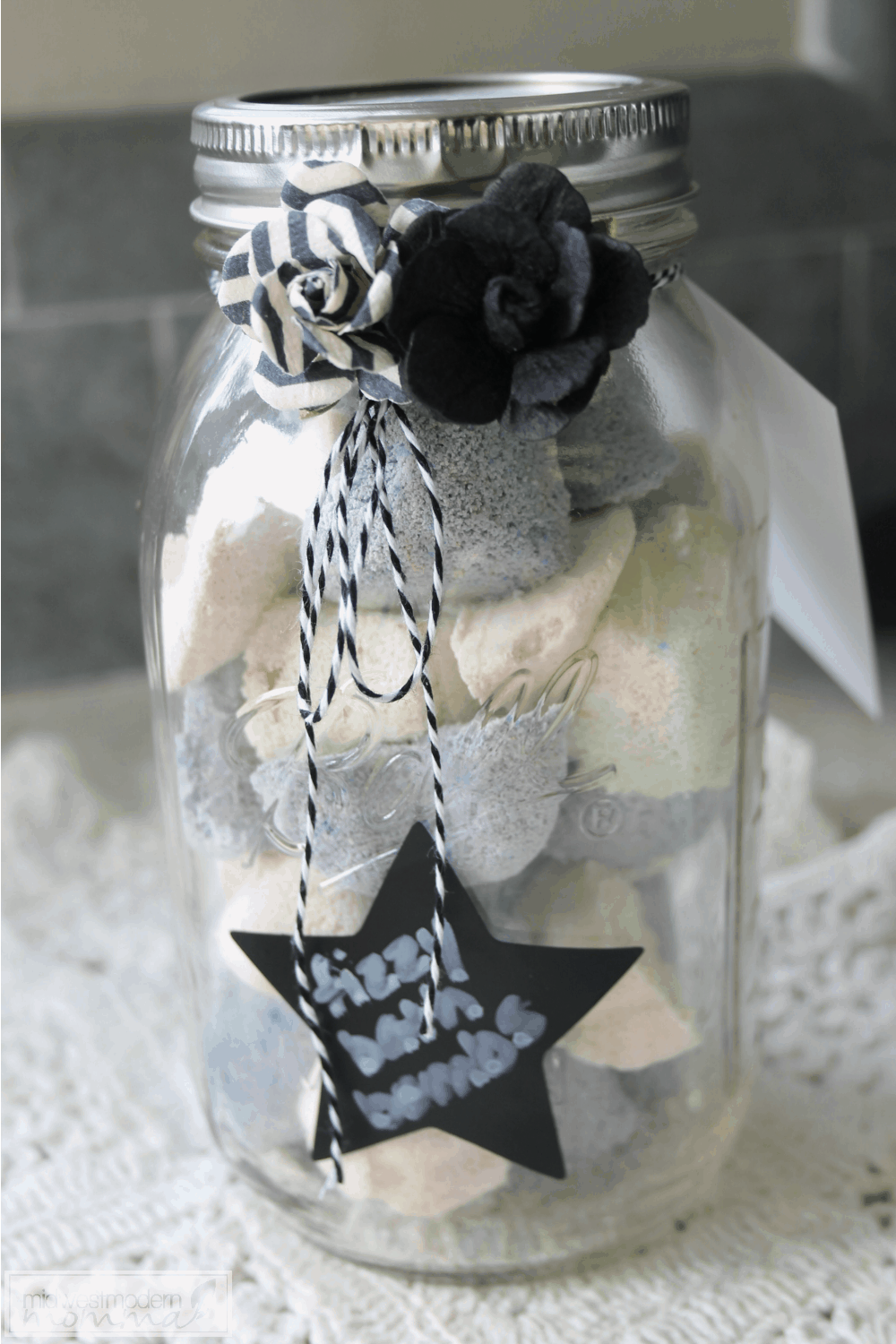 Homemade Bath Bombs are super easy to make and tons of fun! Make our lemon and lavender essential oil scented fizzy homemade bath bombs today!