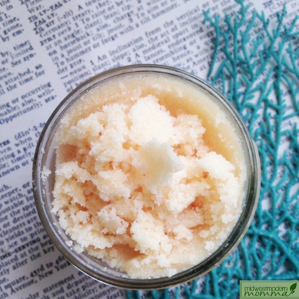 Orange and vanilla sugar scrub in a glass jar.