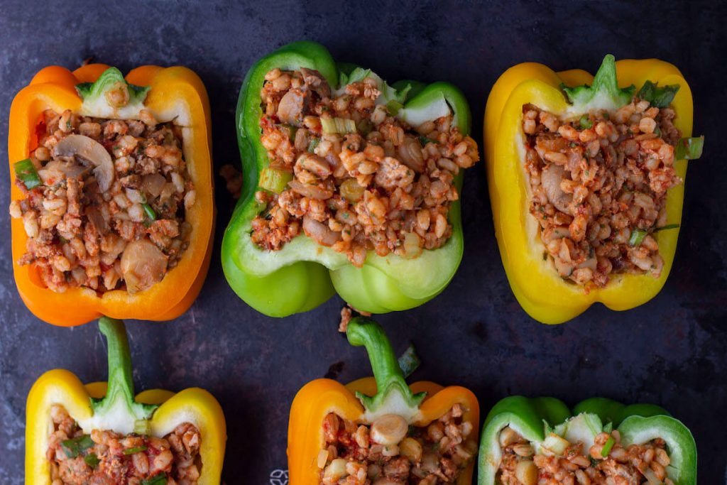 Healthy stuffed peppers with no rice, using barley and ground turkey as base of the filling.