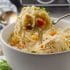 Closeup of a bowl of chicken and dumplings.