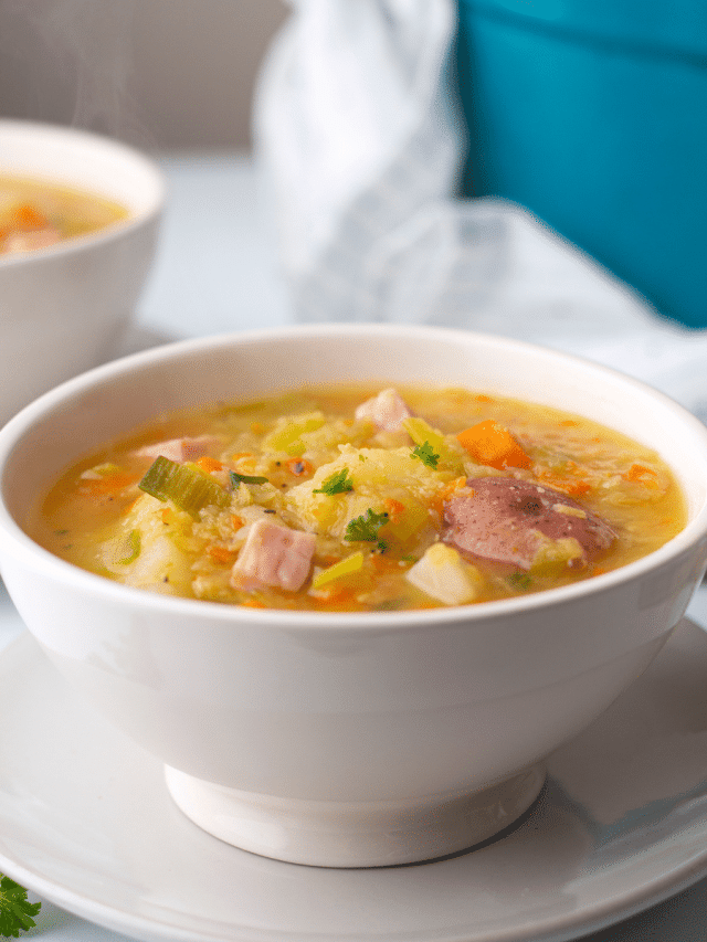 A bowl of lentil soup with ham.