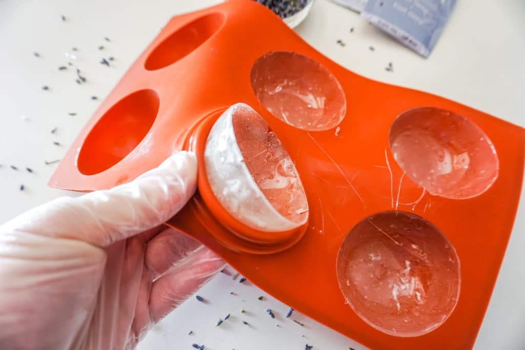 Image showing how to remove hardened isomalt from mold.