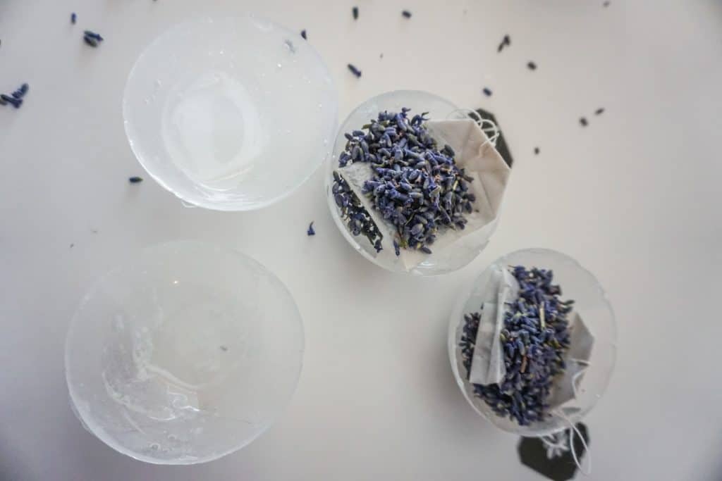Image showing isomalt shells with tea bags and lavender in half of them.