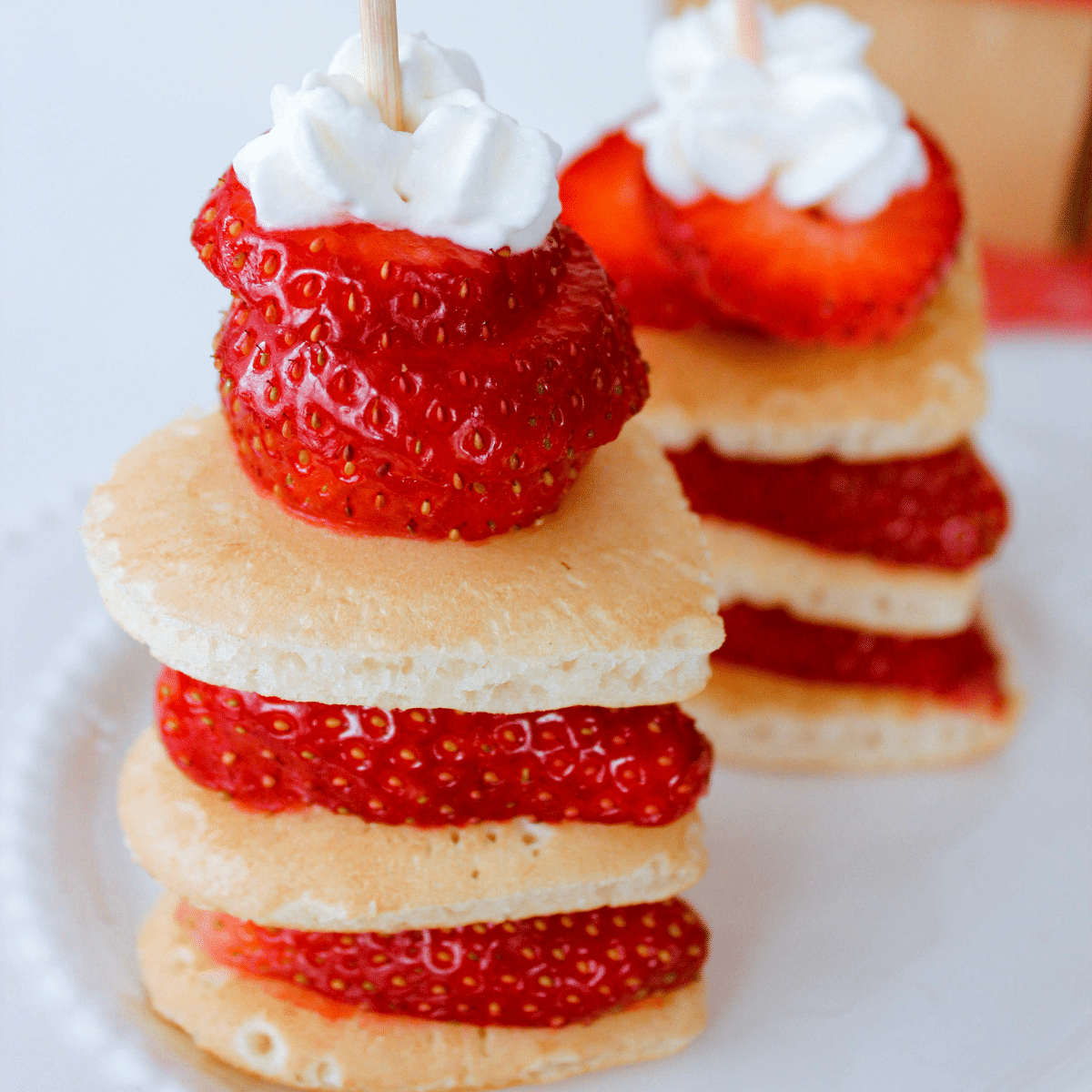 Heart-Shaped Pancakes with Strawberries & Whipped Cream