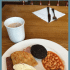 Scottish breakfast food with text overlay.