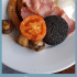 Scottish breakfast food with text overlay.