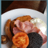 Scottish breakfast food with text overlay.