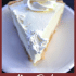 Whole banana cream pie with text overlay describing recipe.