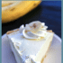 Whole banana cream pie with text overlay describing recipe.