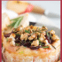 Cranberry baked brie with honey, walnuts, and rosemary with text describing the image.