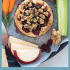 Cranberry baked brie with honey, walnuts, and rosemary with text describing the image.