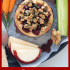 Cranberry baked brie with honey, walnuts, and rosemary with text describing the image.